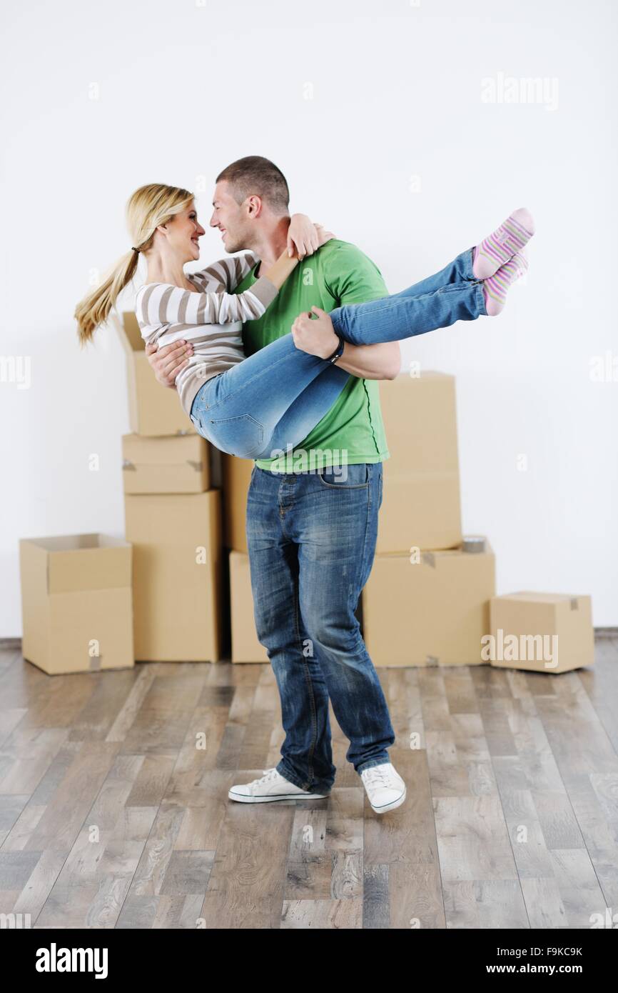 happy Young couple moving in new house Stock Photo - Alamy