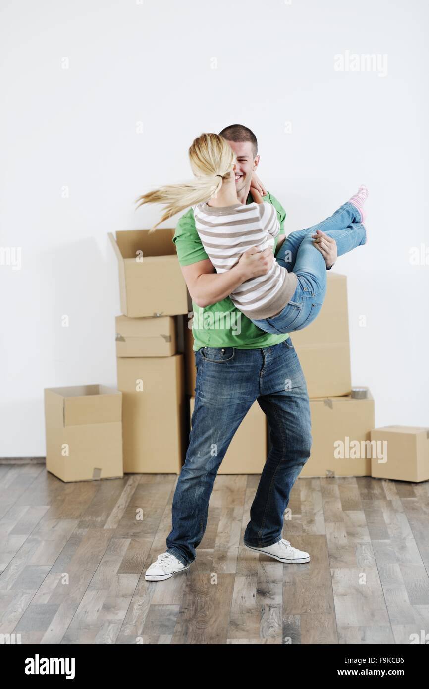 happy Young couple moving in new house Stock Photo - Alamy