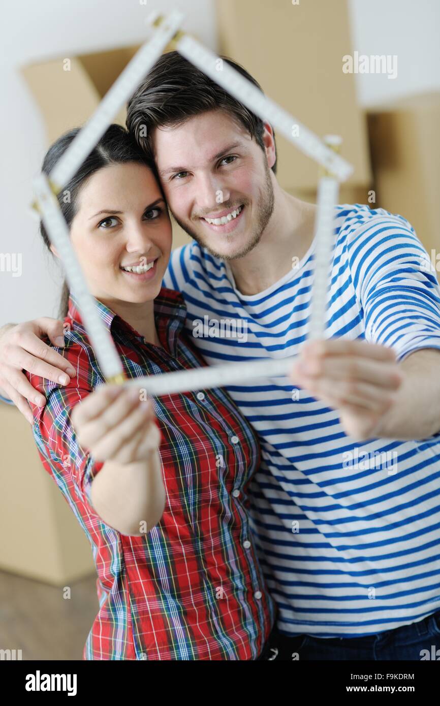 happy Young couple moving in new house Stock Photo - Alamy