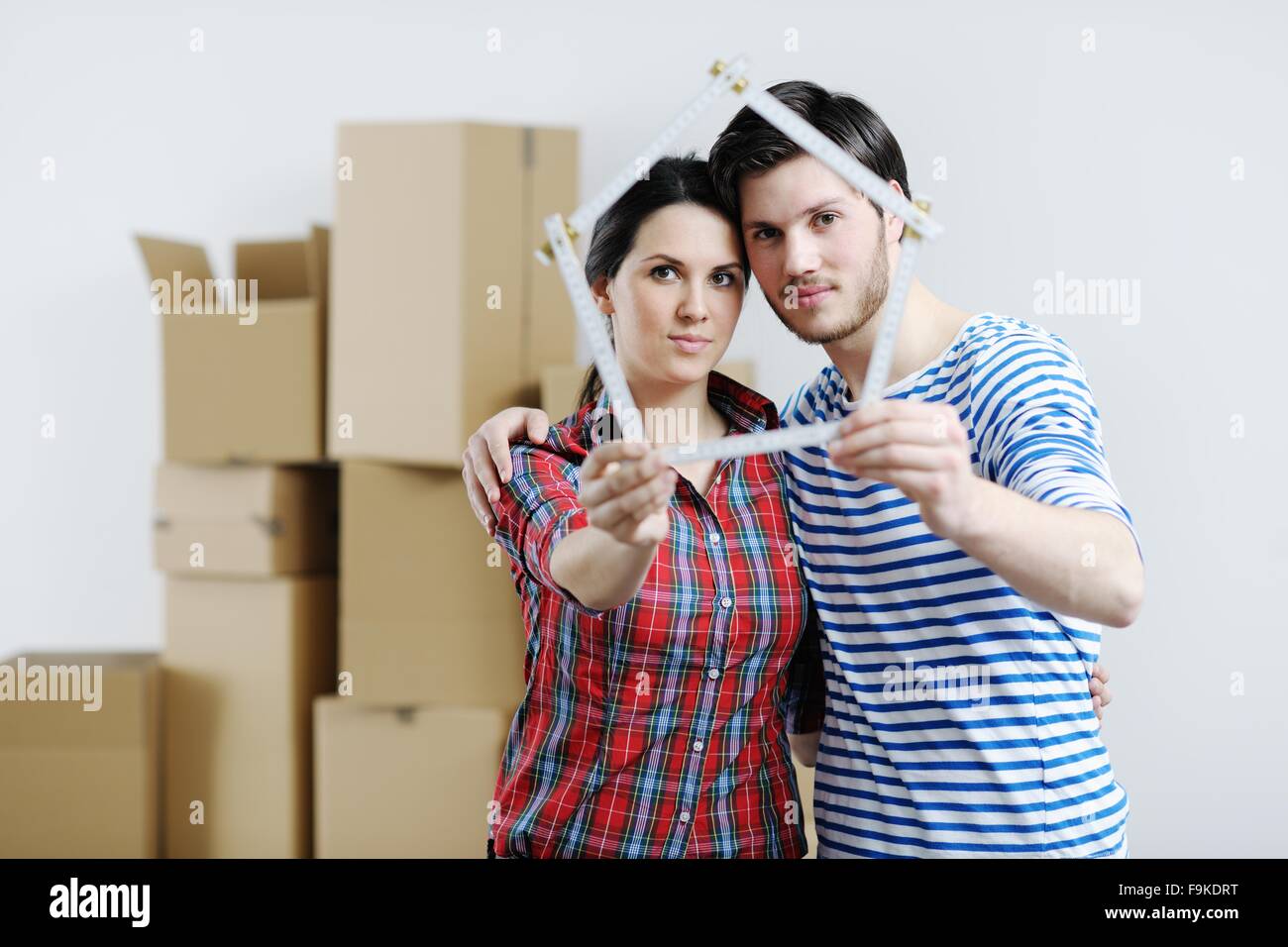 happy Young couple moving in new house Stock Photo - Alamy