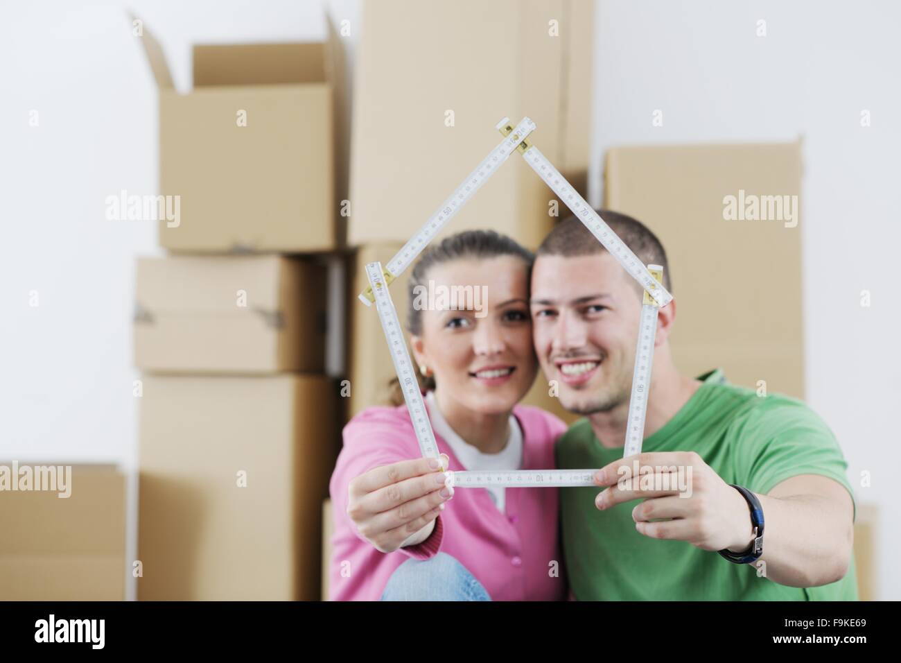 happy Young couple moving in new house Stock Photo - Alamy