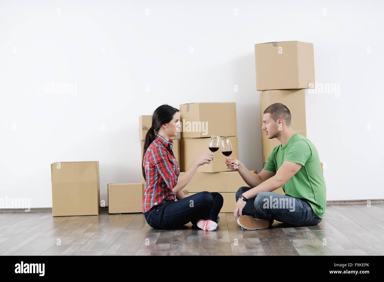 happy Young couple moving in new house Stock Photo - Alamy