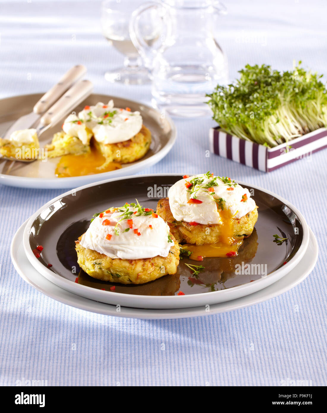 Cabbage and potato cakes with poched egg Stock Photo Alamy