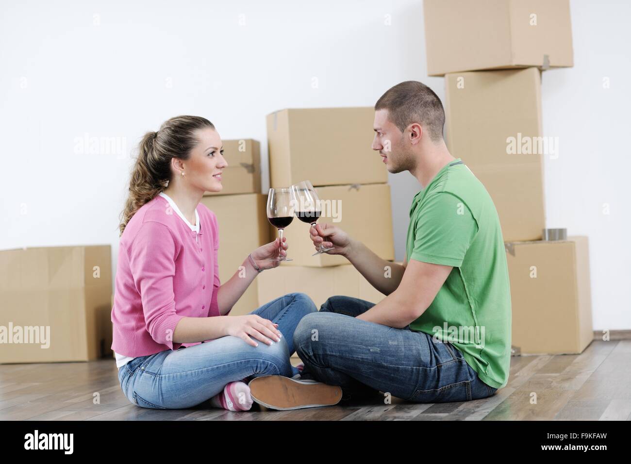 happy Young couple moving in new house Stock Photo - Alamy