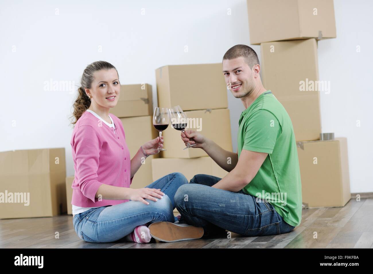 happy Young couple moving in new house Stock Photo - Alamy