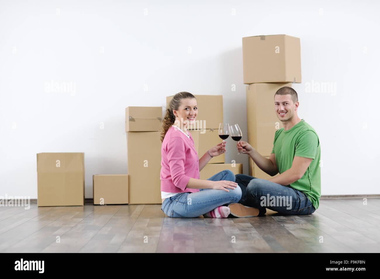 happy Young couple moving in new house Stock Photo - Alamy