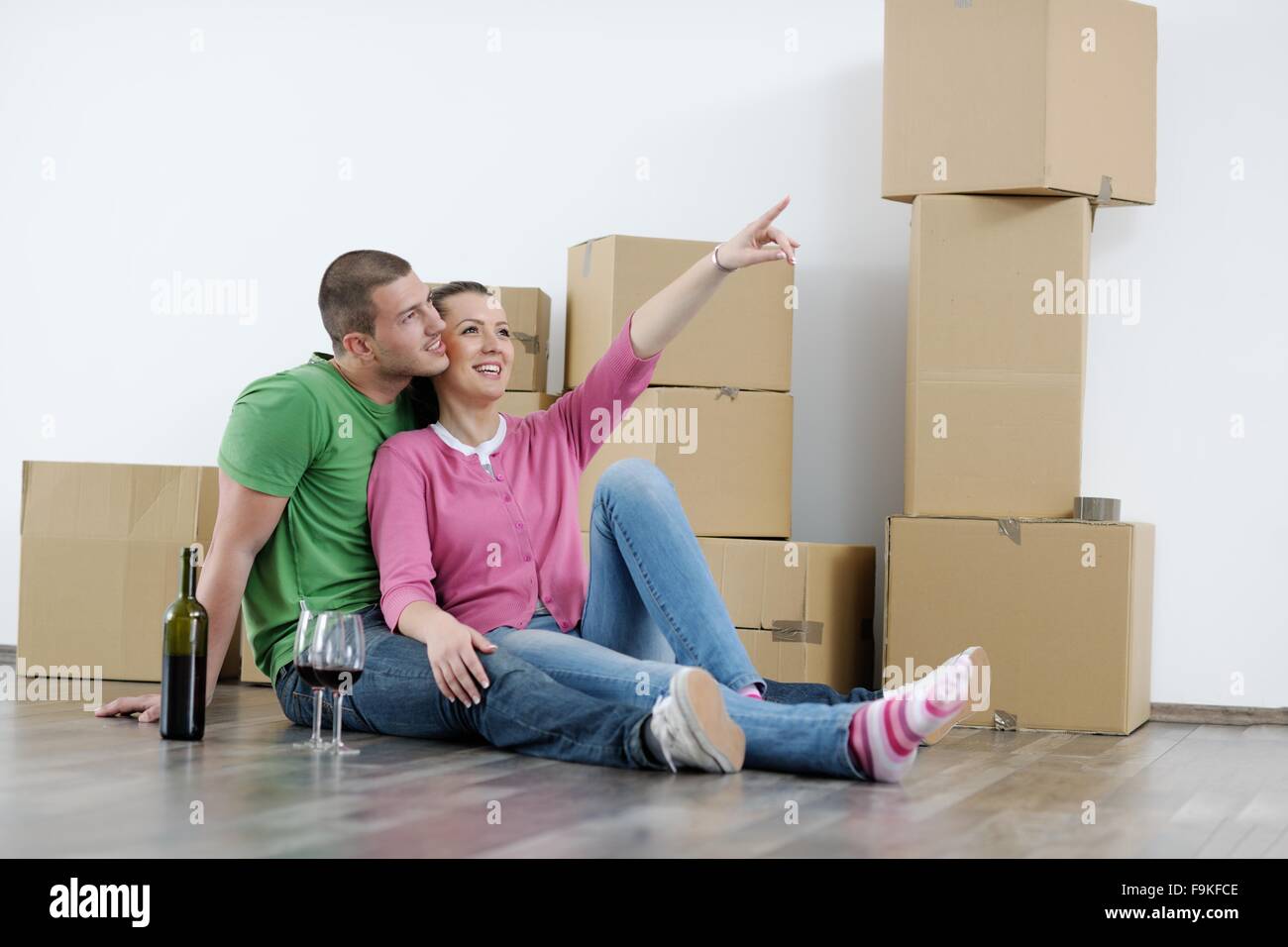 happy Young couple moving in new house Stock Photo - Alamy