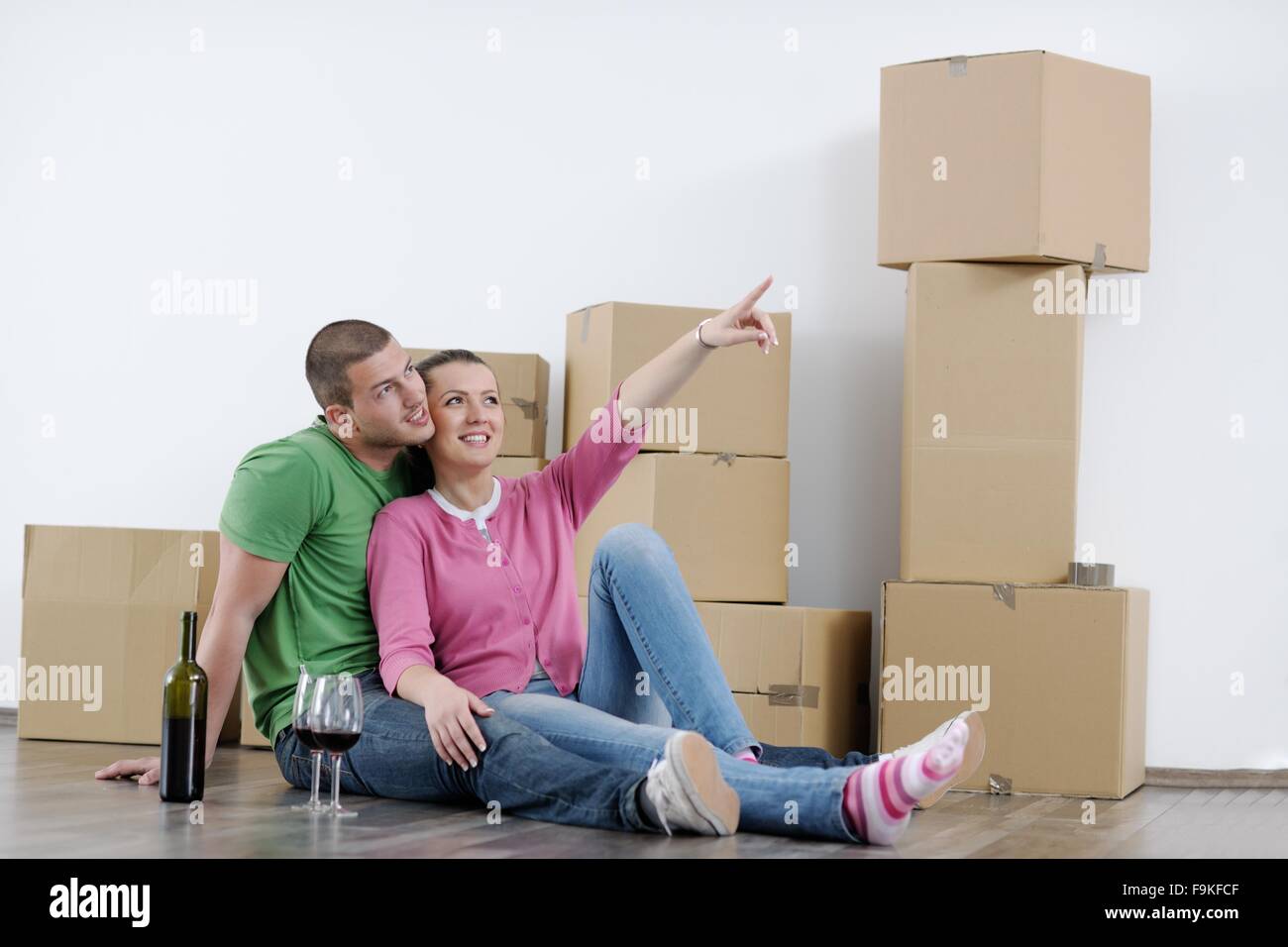 happy Young couple moving in new house Stock Photo - Alamy