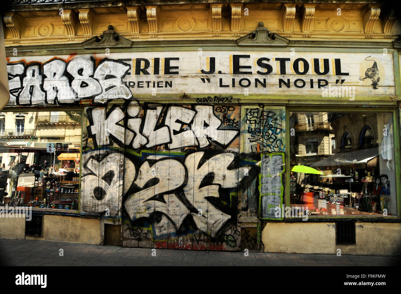 Graffiti covered toy shop Montpellier, Languedoc-Roussillon, France, Europe Stock Photo