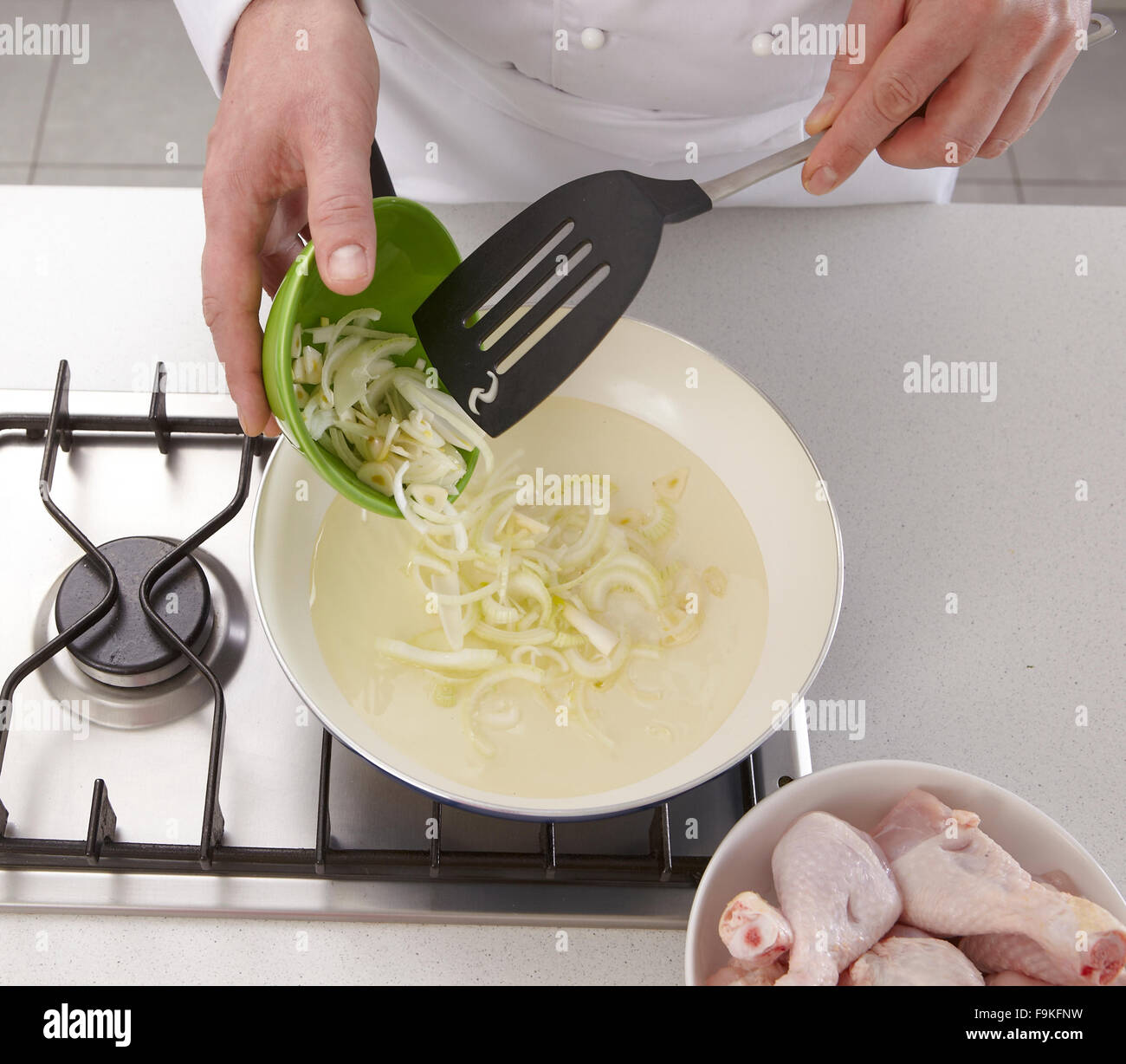Chicken drumsticks in tomato sauce + steps Stock Photo Alamy