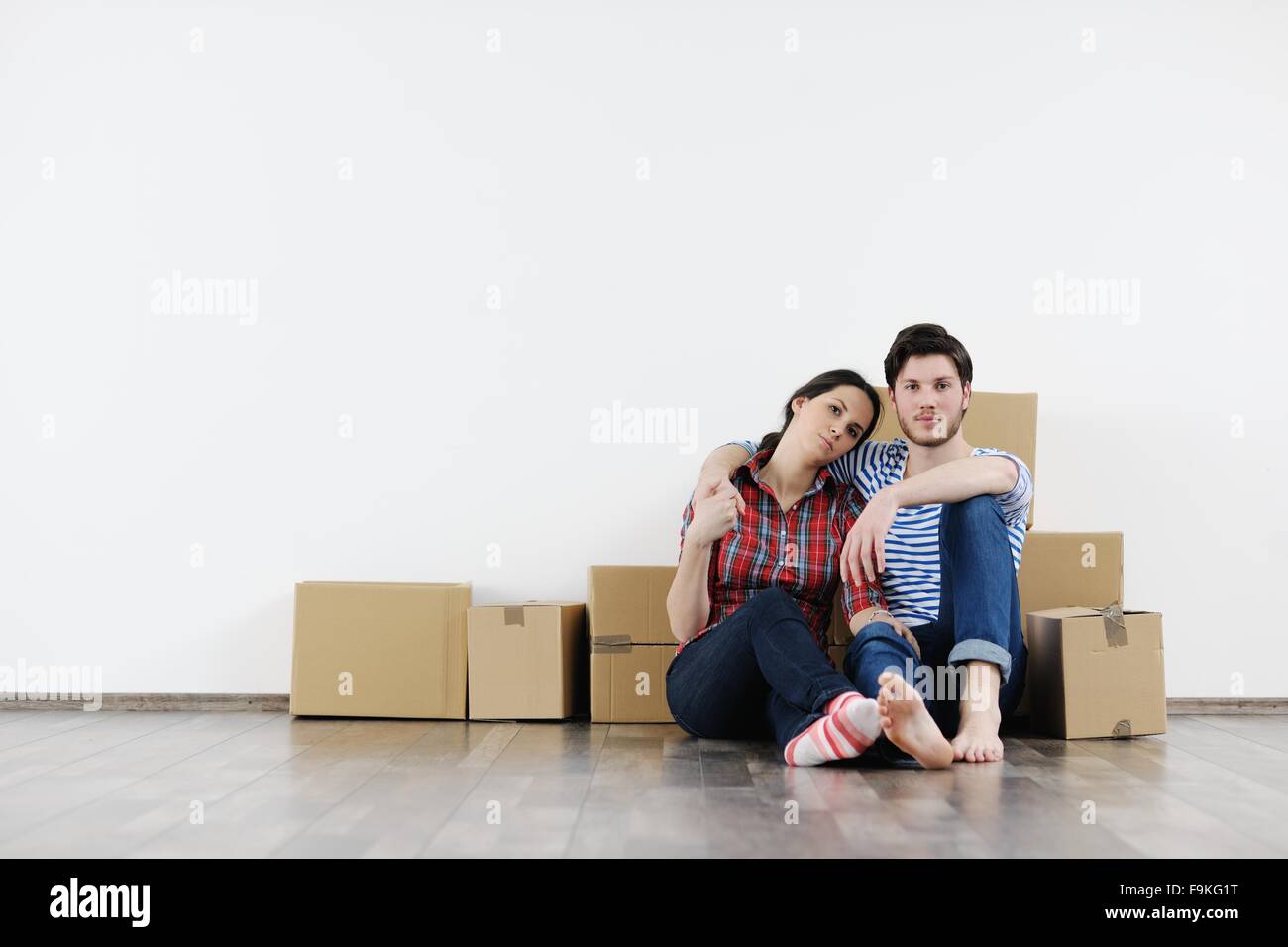 happy Young couple moving in new house Stock Photo - Alamy