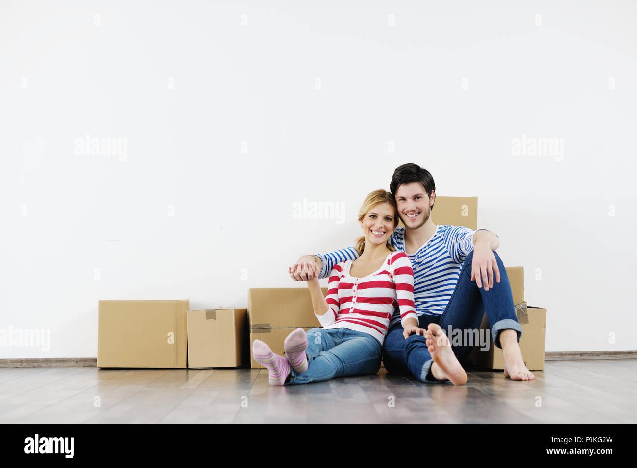 happy Young couple moving in new house Stock Photo - Alamy