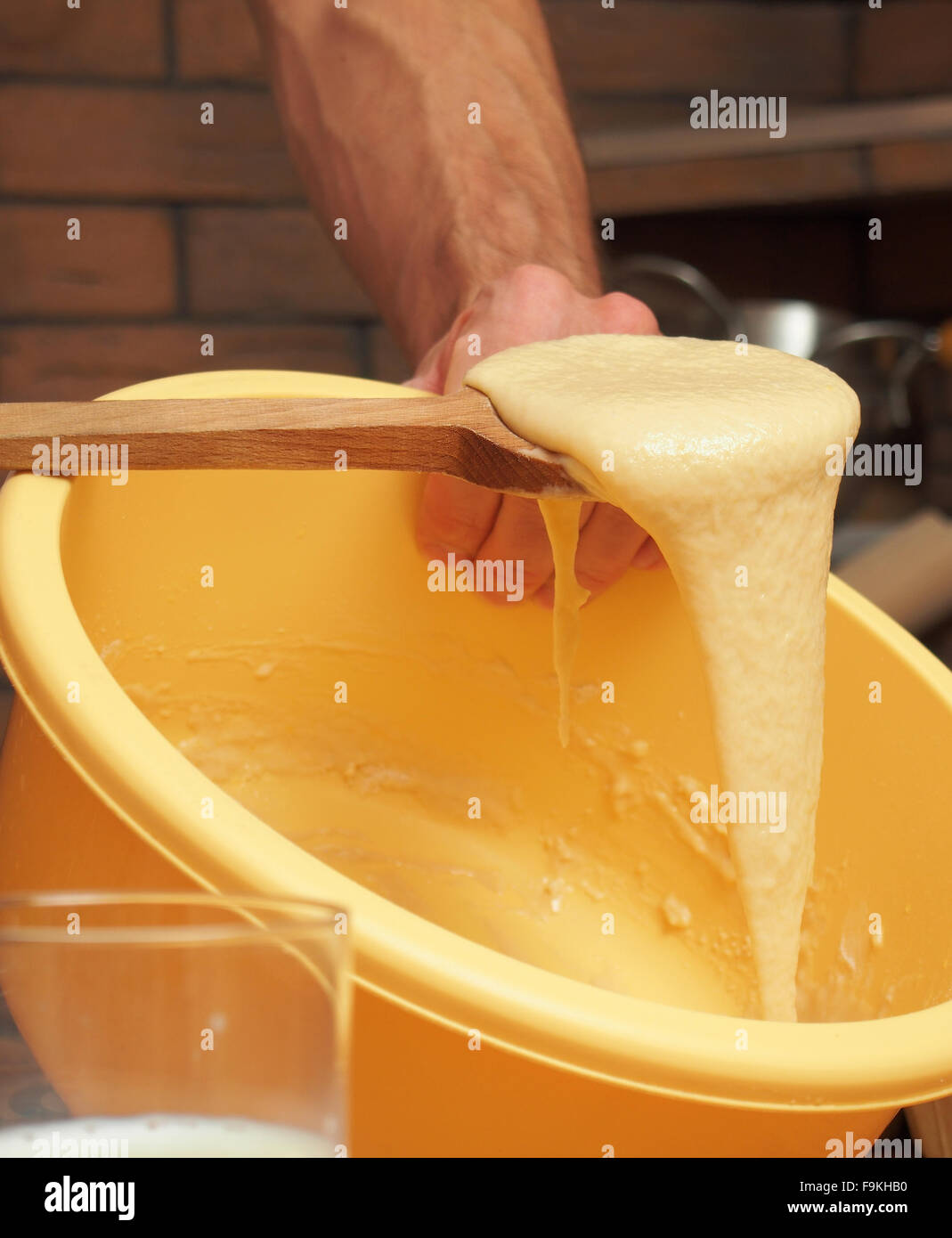 Mixing batter. Making yeast pancakes (crepes Stock Photo Alamy