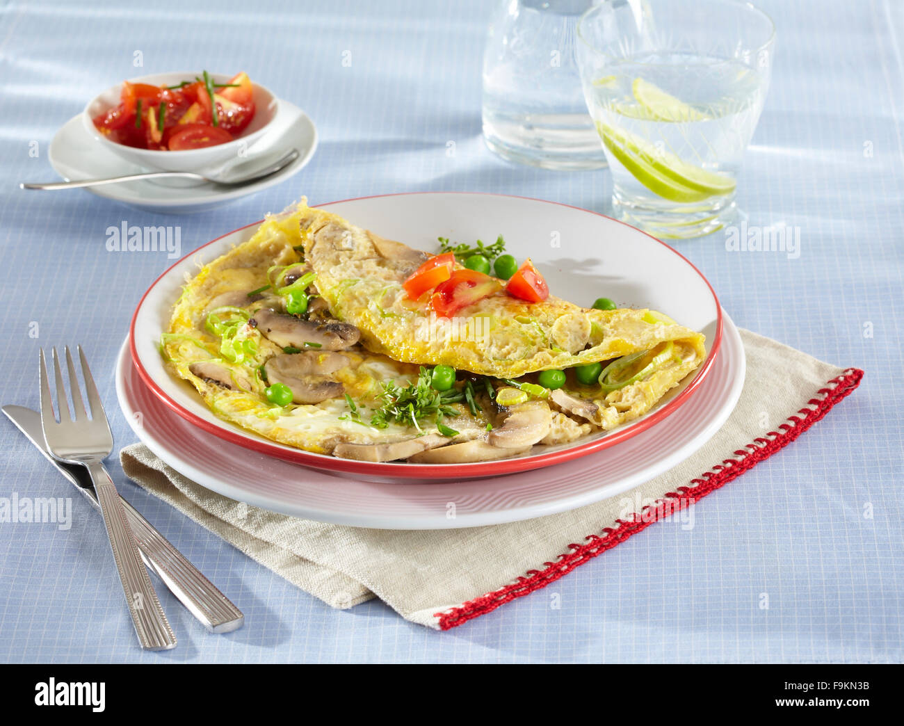 Mushroom and pea omelette Stock Photo Alamy