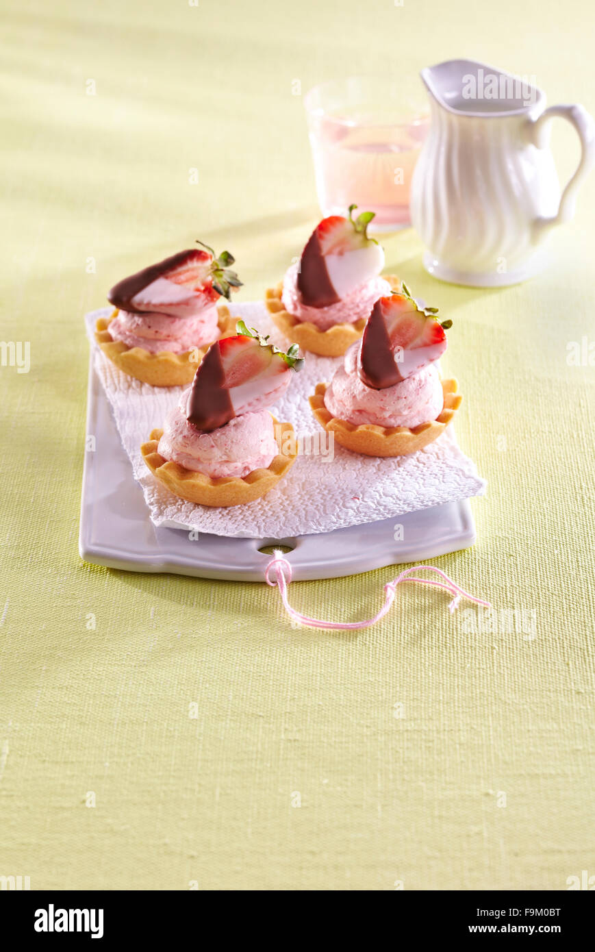 Strawberry cream tartlets Stock Photo Alamy