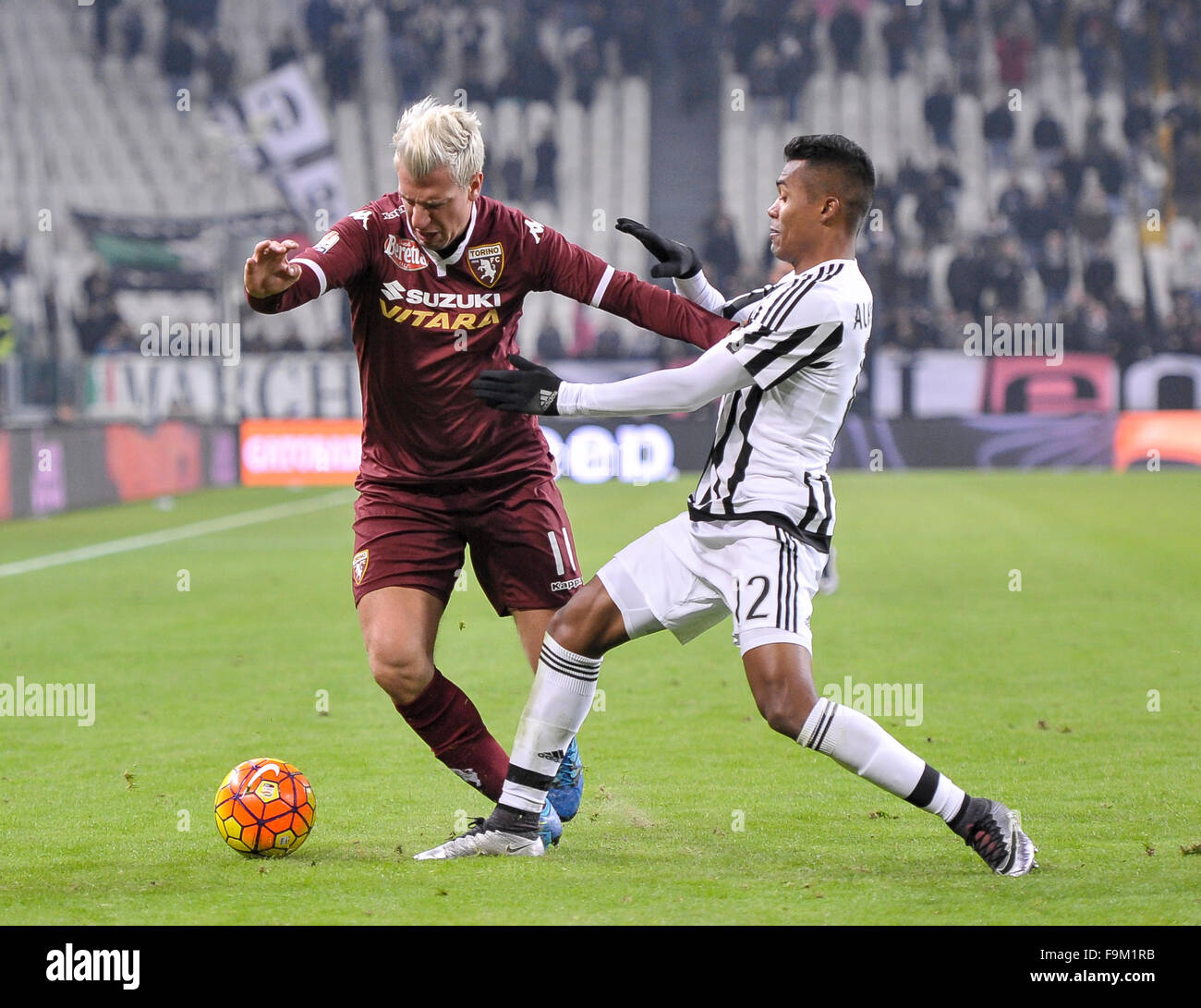 Turin, Italy. 16th Dec, 2015. Maxi Lopez (left) and Alex Sandro (right) fight for the ball during the Italy Cup match between Juventus FC and Torino FC. © Nicolò Campo/Pacific Press/Alamy Live News Stock Photo