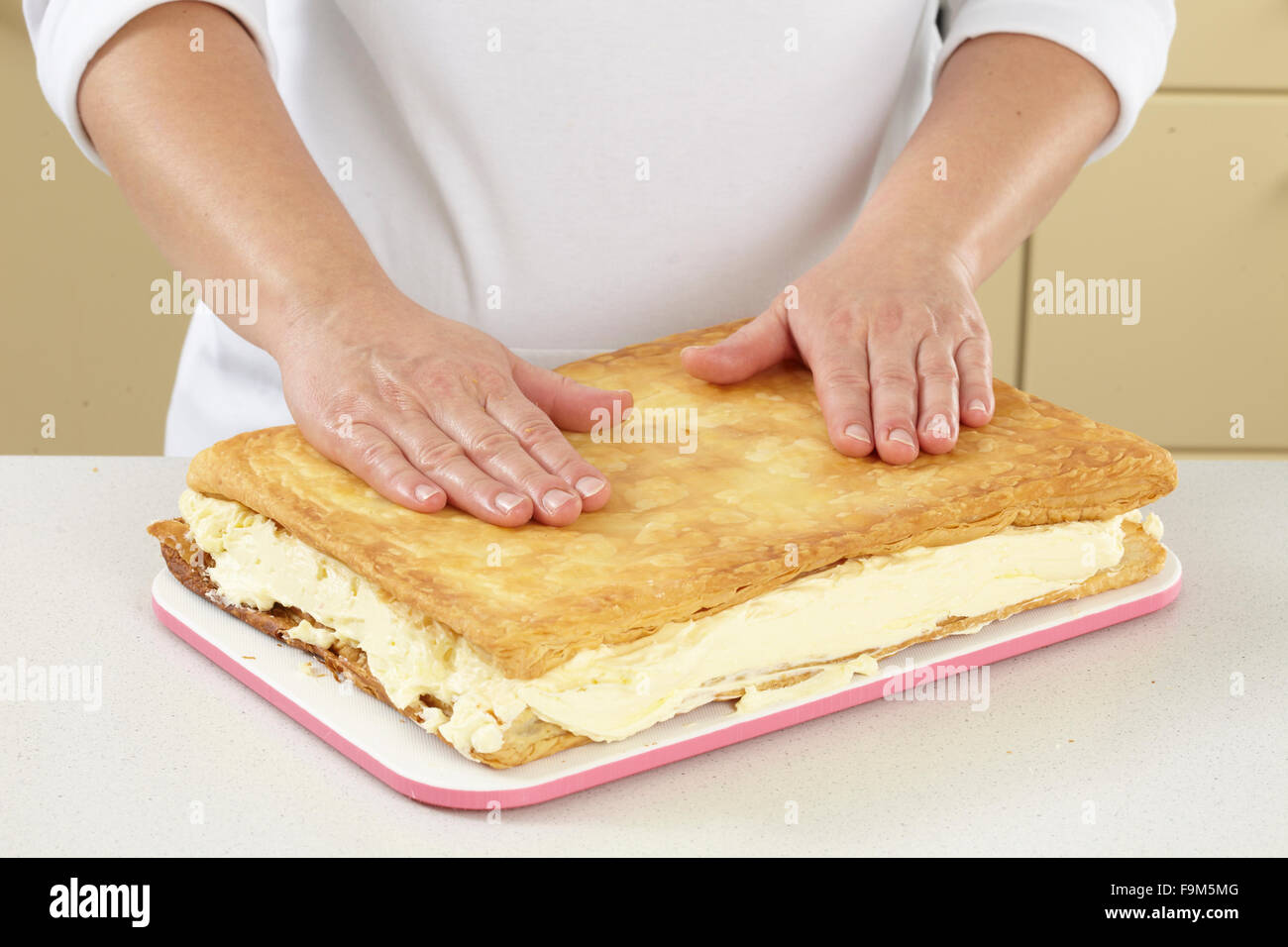 Cream slice + steps Stock Photo Alamy