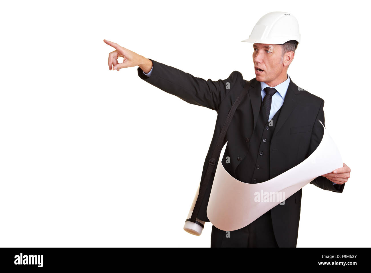 Architect with white hard hat point to the left Stock Photo