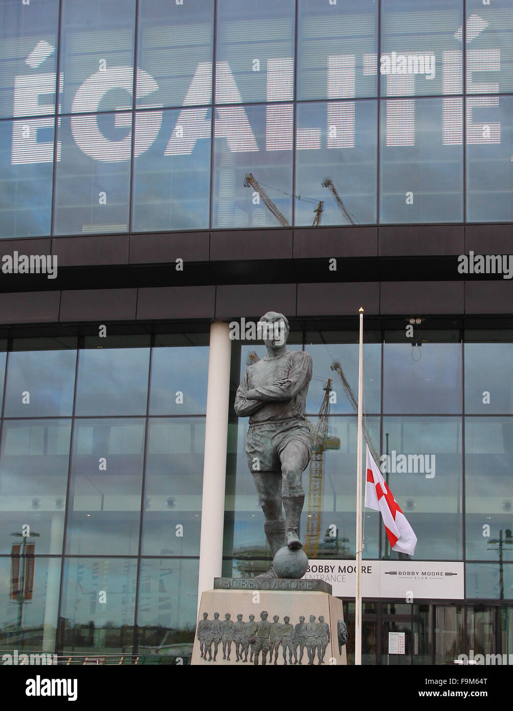 The 11am silence for the tragic events in Paris, English flag at half mast outside the Bobby Moore entrance Wembley Stadium.  Featuring: Atmosphere Where: London, United Kingdom When: 16 Nov 2015 Stock Photo