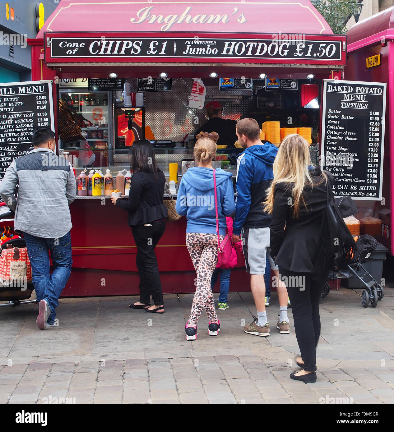 Manchester city centre food concession kiosks serving fast food - burgers, chips hotdogs drinks etc opposite the Arndale Centre. Stock Photo