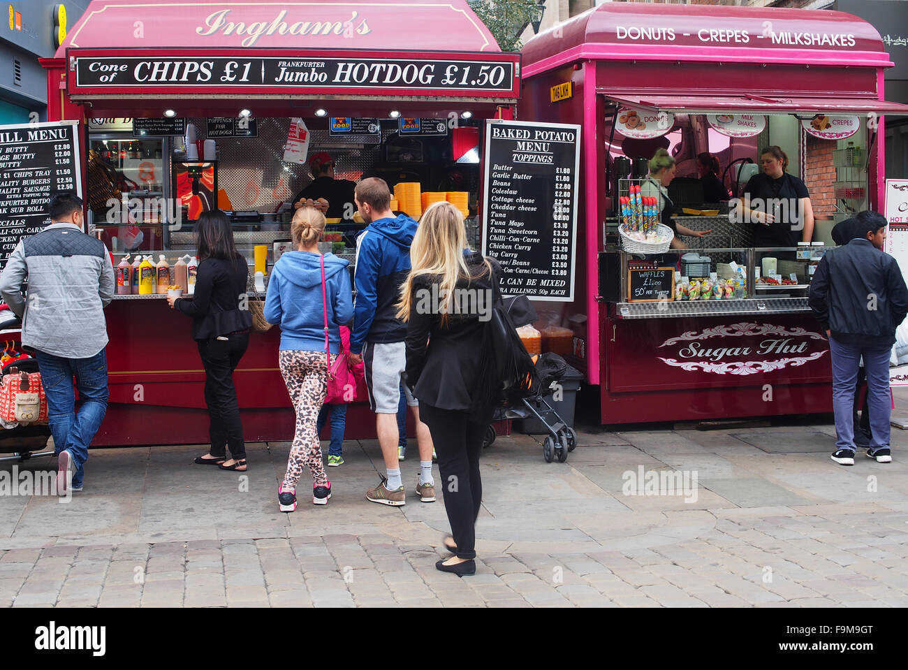 Manchester city centre food concession kiosks serving fast food opposite the Arndale Centre. Stock Photo