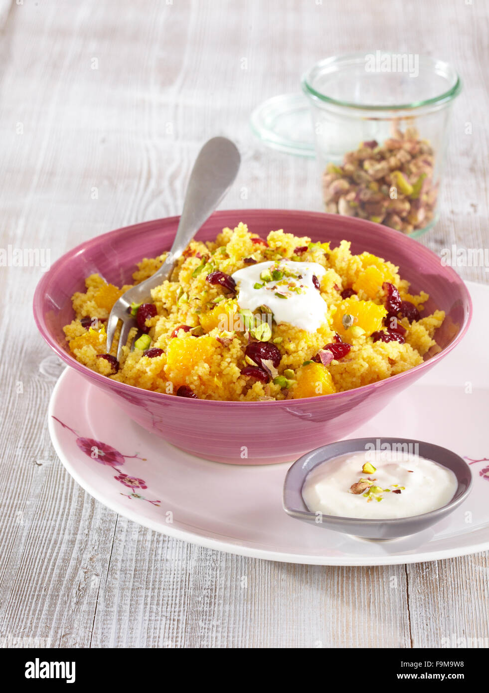 Orange and raisin couscous Stock Photo Alamy