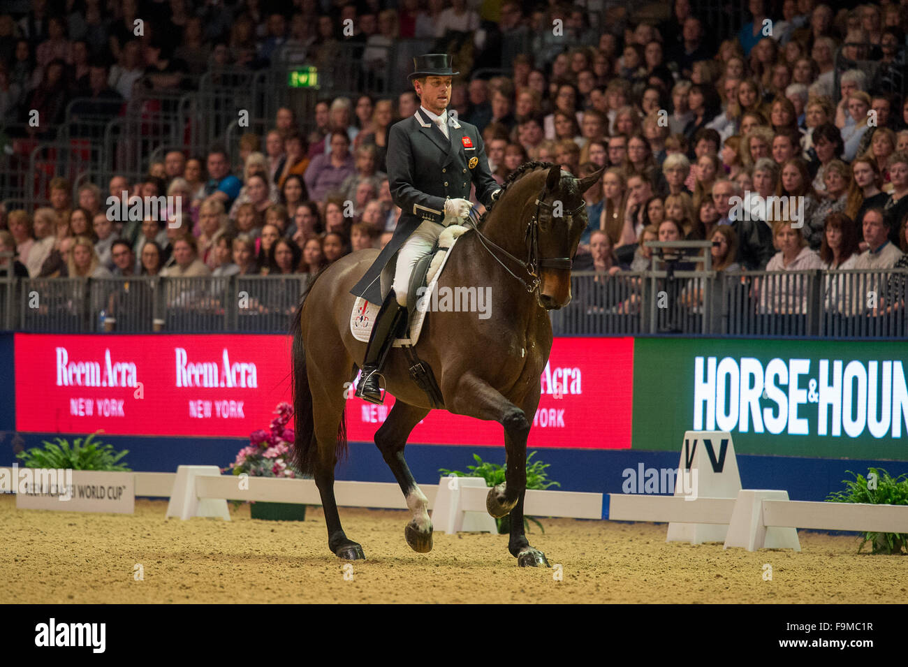 London, UK. 16th Dec, 2015. Carl Hester of Britain competes during the sixth leg of the Reem Acra FEI World Cup Dressage Western European League at Olympia in London, Britain on Dec. 16, 2015. Carl Hester claimed the title with 83.750 points. © FEI/Jon Stroud Media/Xinhua/Alamy Live News Stock Photo