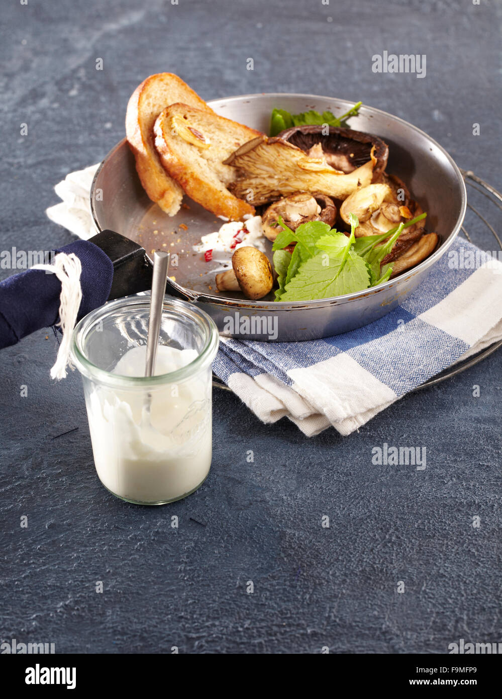 Mushrooms and goat cheese warm salad Stock Photo Alamy