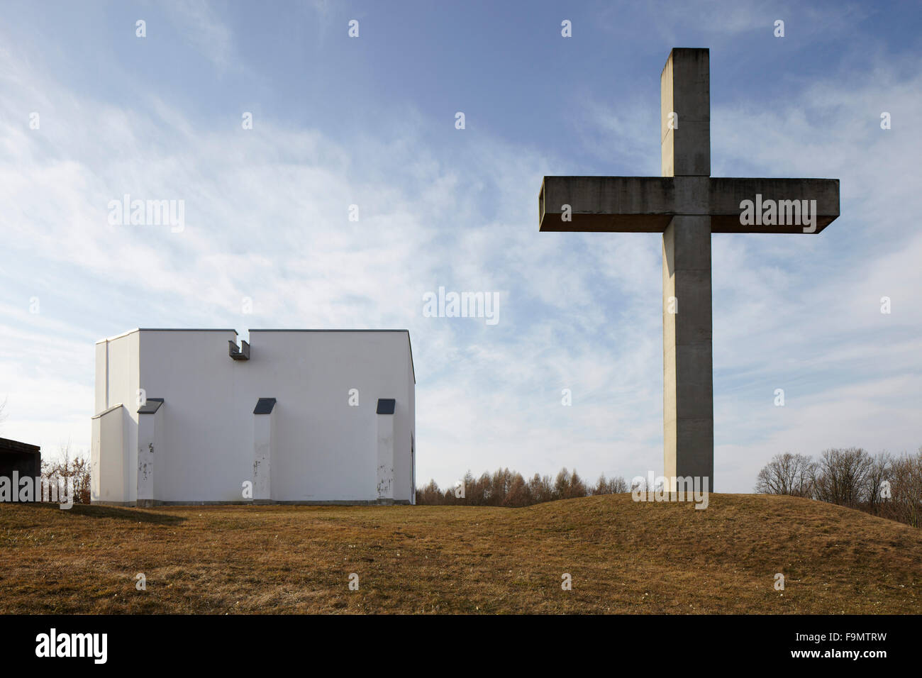 Battle of Mogersdorf  Memorial Chapel 1964,  Schloesselberg near Mogersdorf, Burgenland, Austria. Concrete cross in front of chapel. Stock Photo