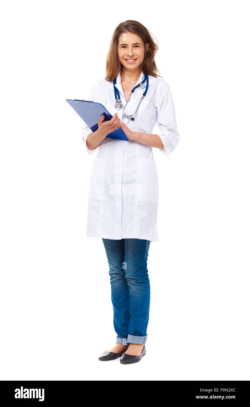 Portrait of happy young doctor isolated on white background. Stock Photo