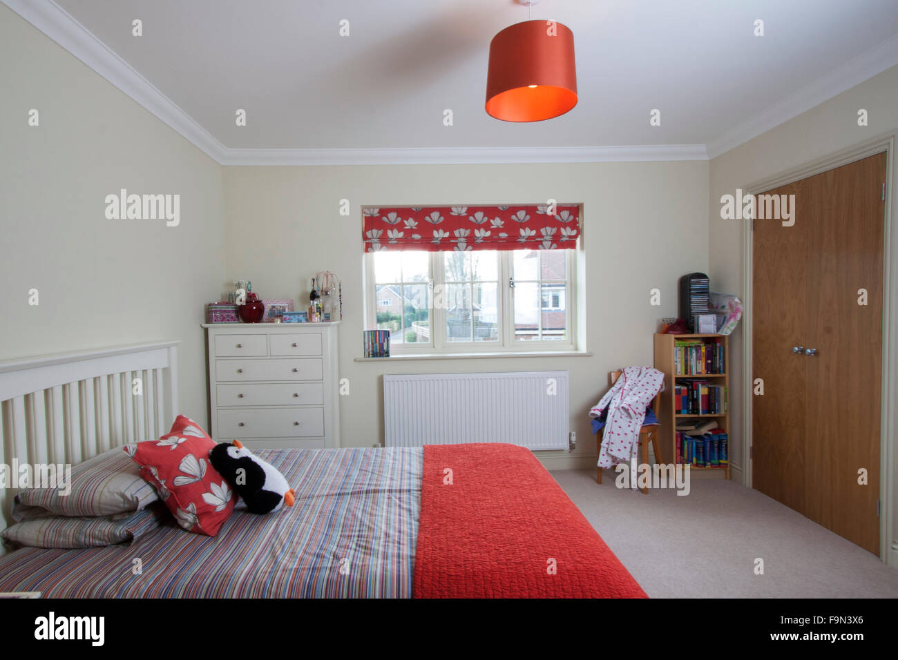 Bedroom with a red colour scheme Stock Photo