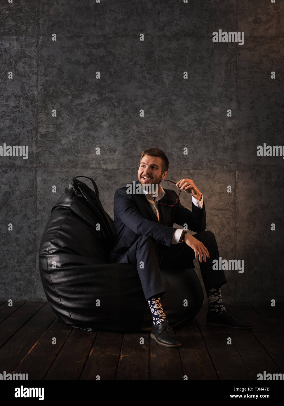 Pensive man sitting on bean hi-res stock photography and images - Alamy