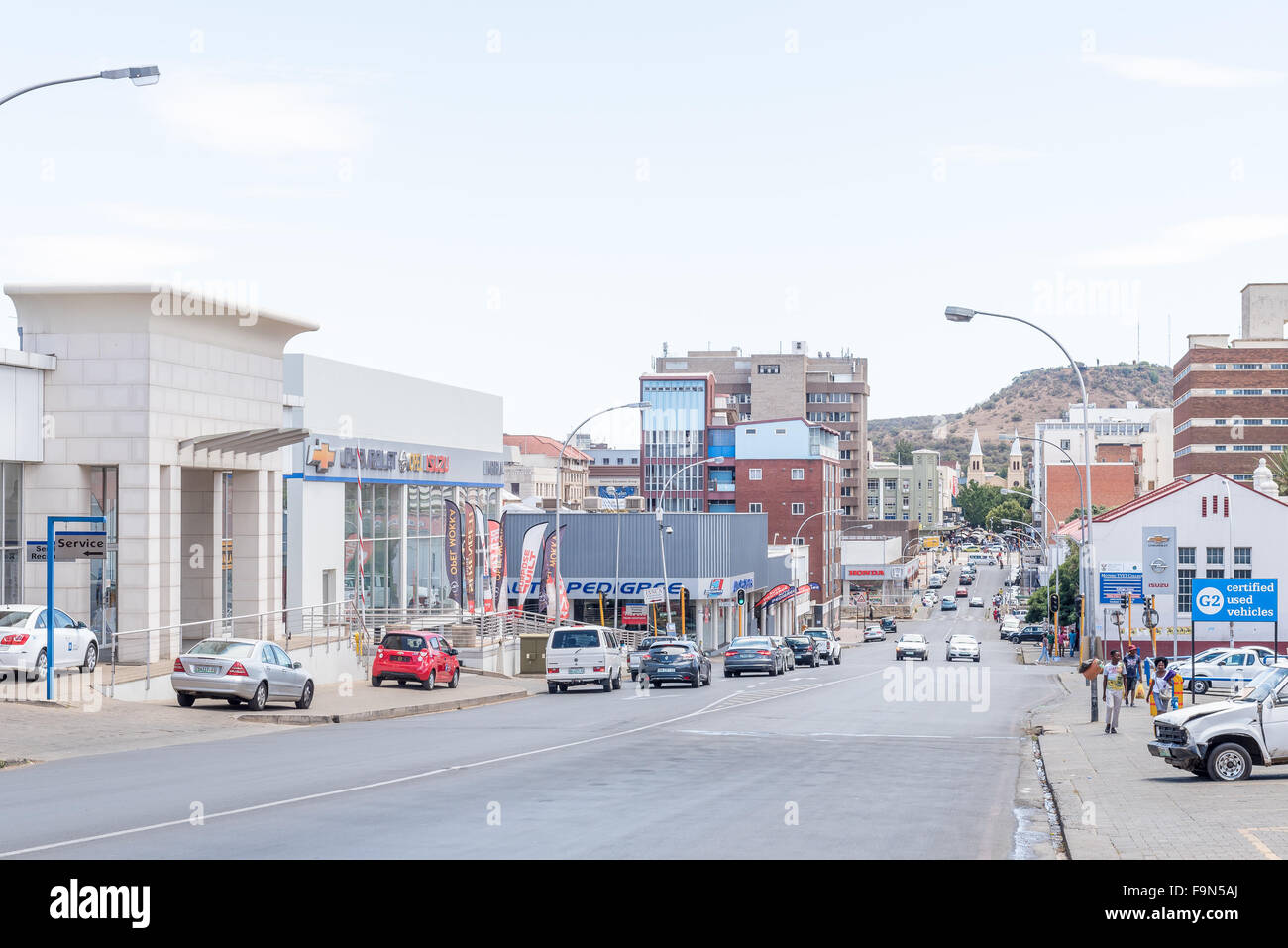 Church Street Street View Bloemfontein, South Africa, December 16, 2015: View Of Upper Church Street  With The Twin Spired Church In The Back. The Statue O Stock Photo - Alamy