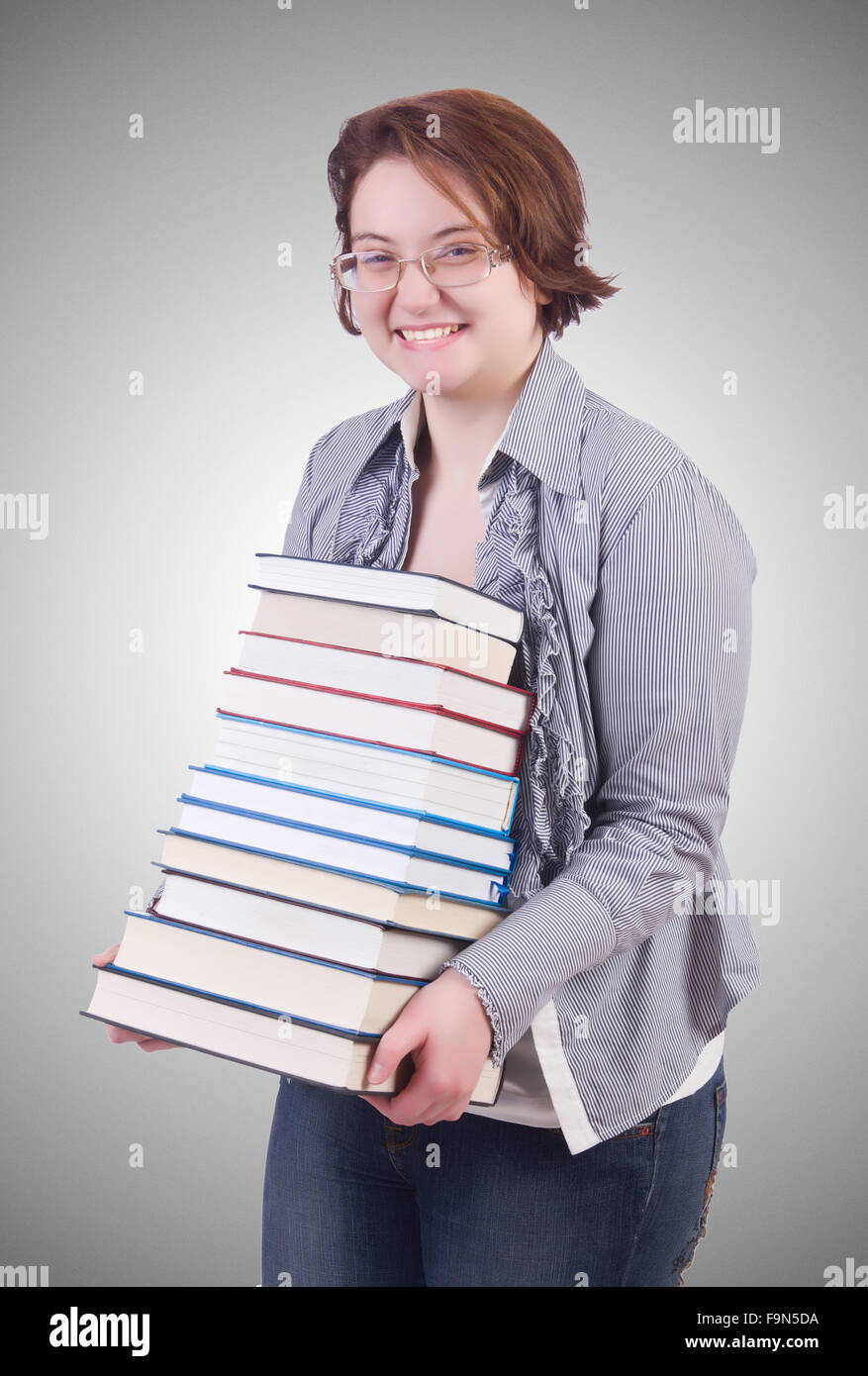 Girl student with books on white Stock Photo - Alamy