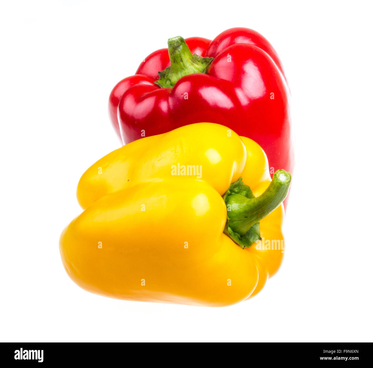 Red and yellow sweet pepper isolated on white background Stock Photo ...