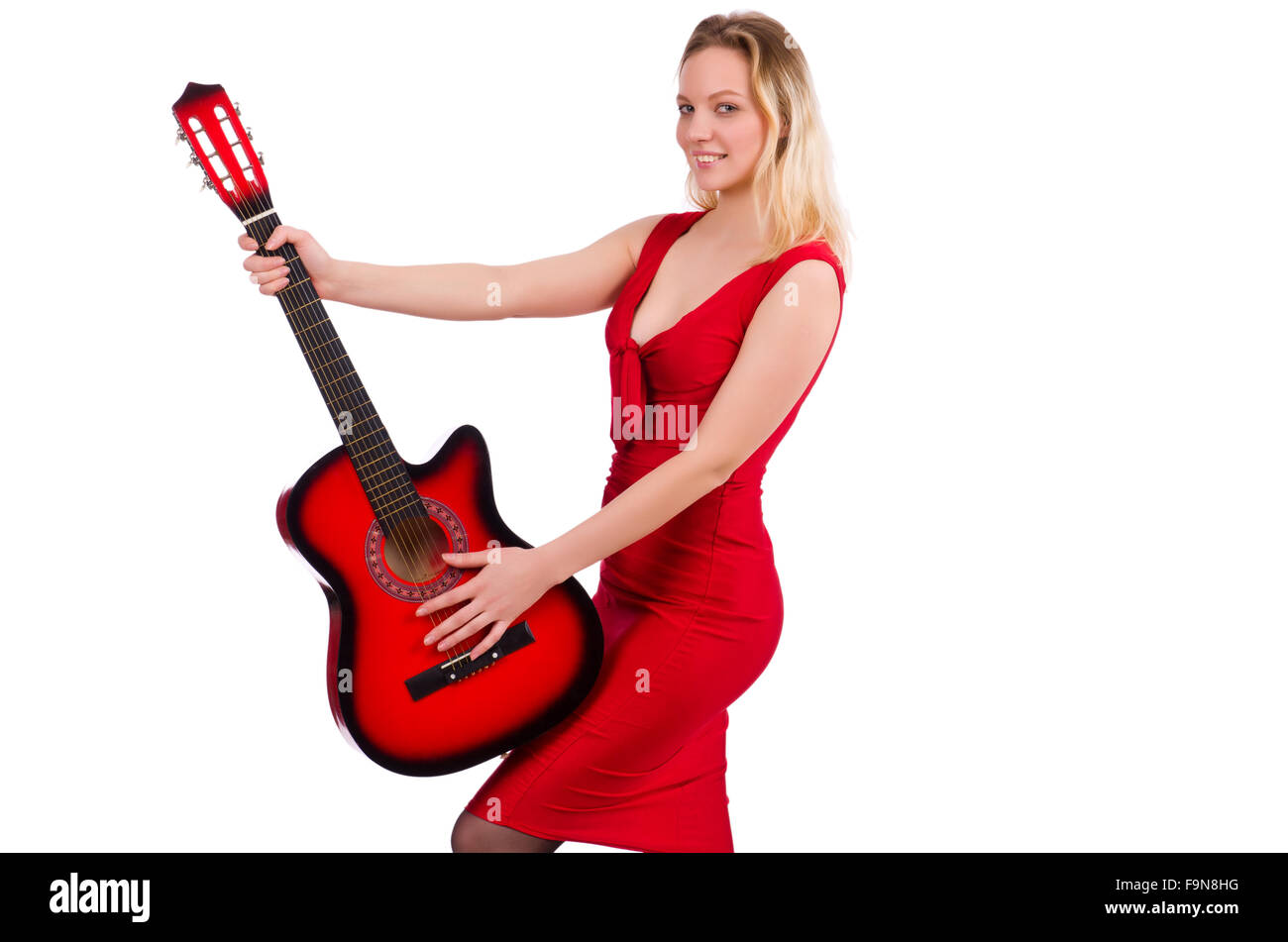Pretty girl holding guitar isolated on white Stock Photo - Alamy