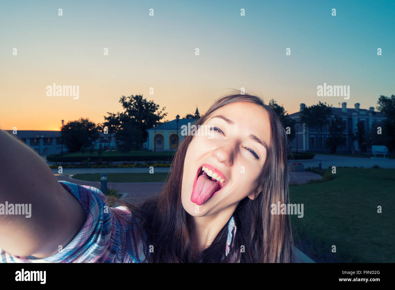 Young funny girl is making selfie Stock Photo