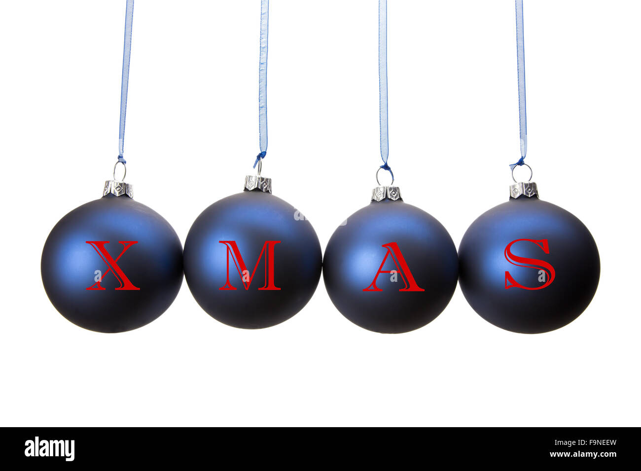 Four blue christmas balls with letters of word XMAS hanging in row isolated on white background Stock Photo