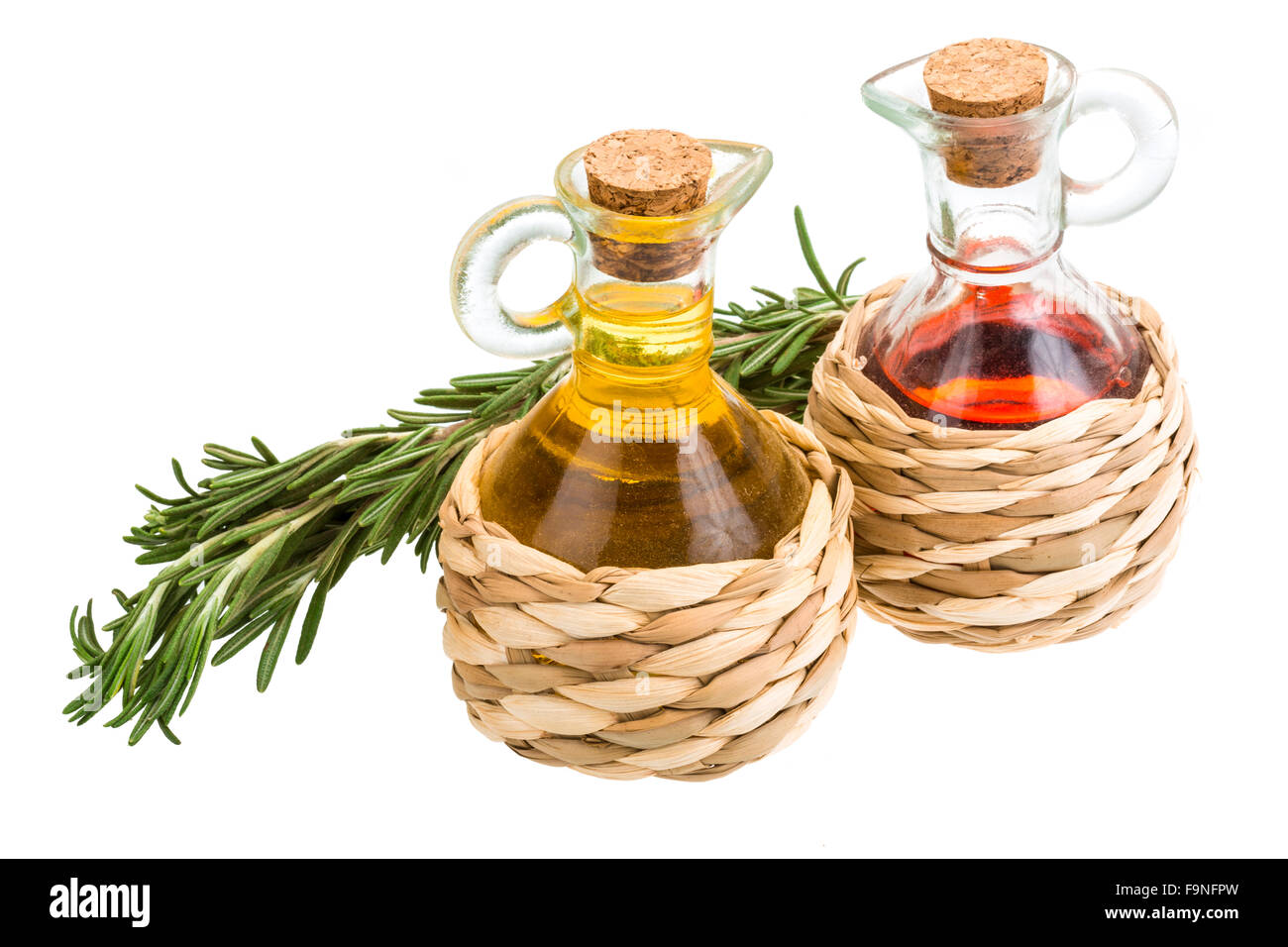 Oil, vinegar and rosemary isolated Stock Photo Alamy