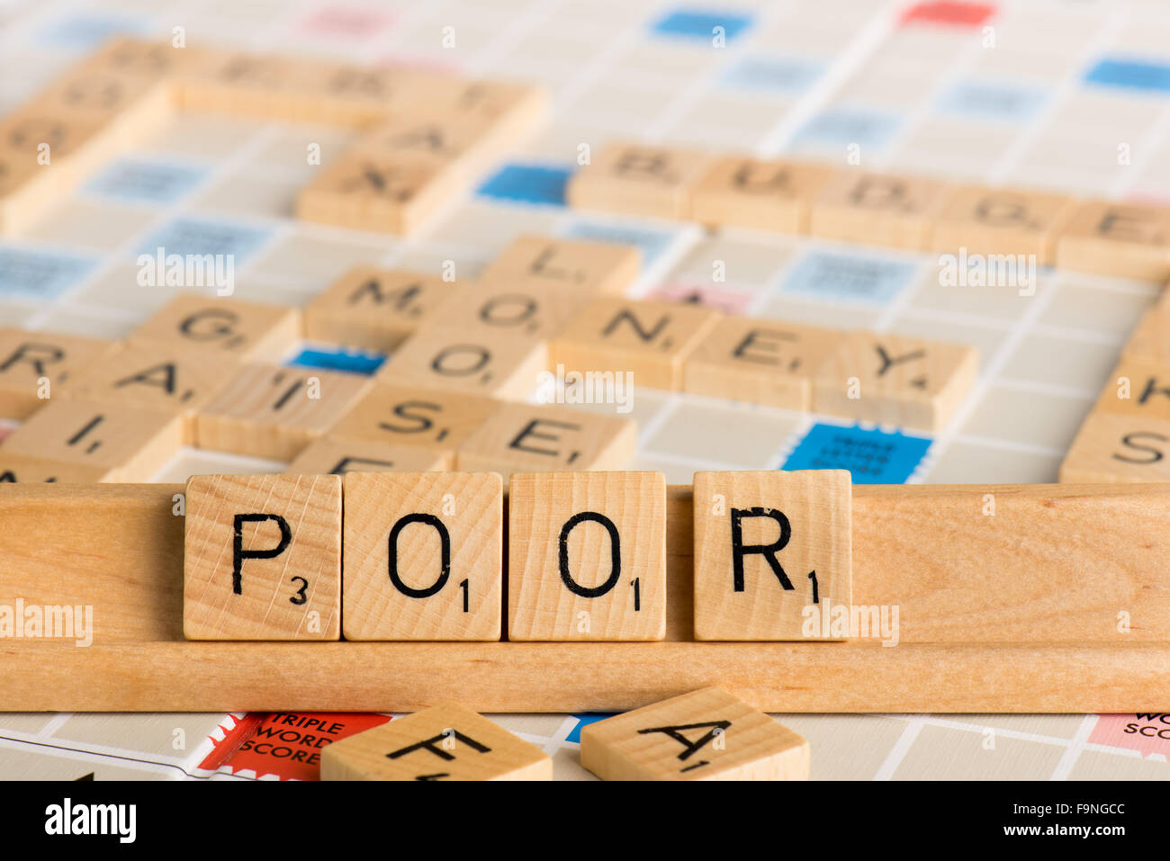 Scrabble - POOR Stock Photo