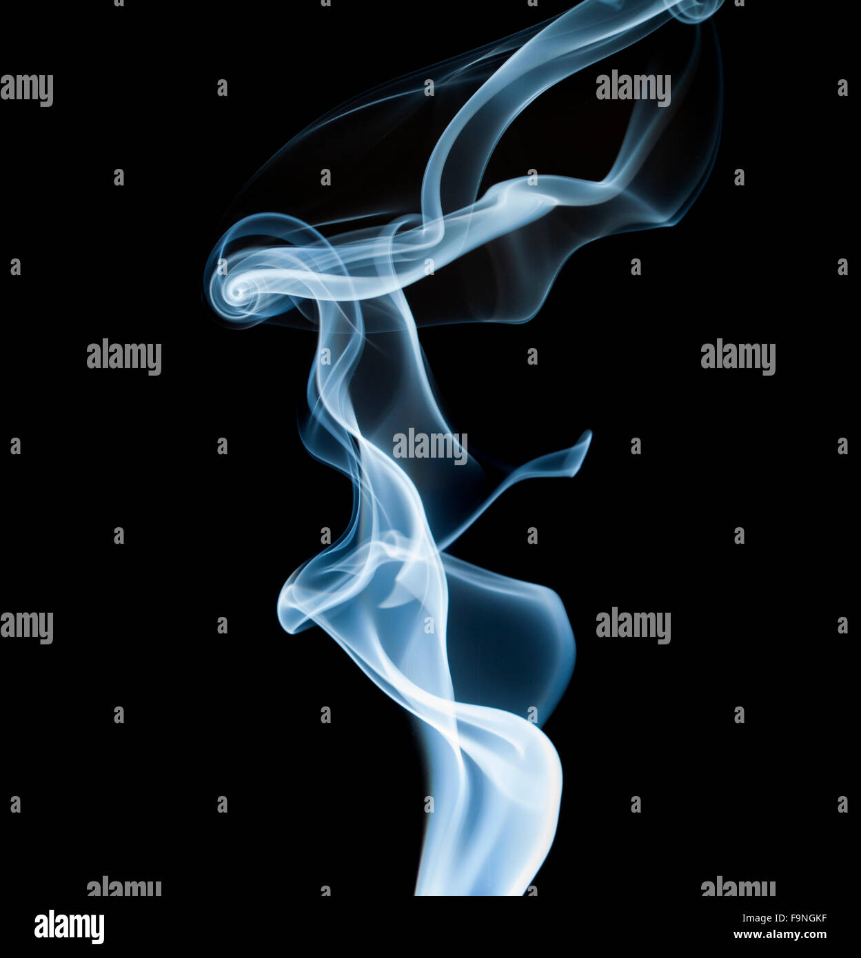 wisp of smoke on black background Stock Photo - Alamy