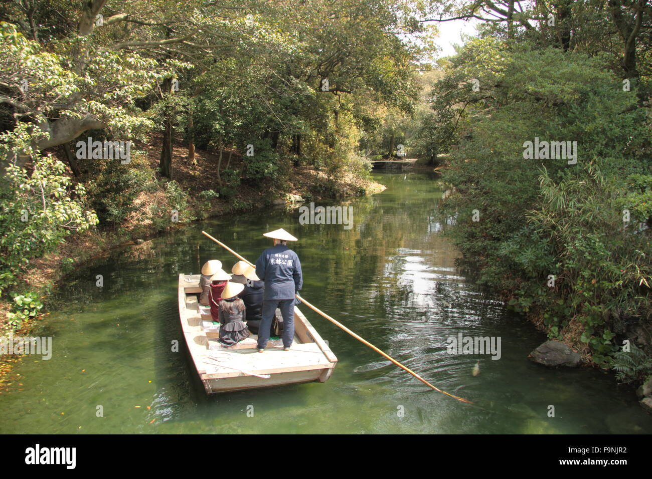 boatman on pond Stock Photo