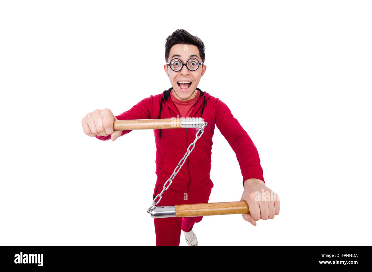 Funny sportsman with nunchuks isolated on white Stock Photo