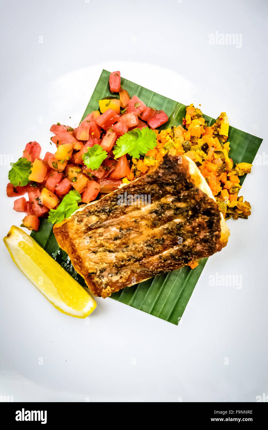 Pan fried white snapper Stock Photo - Alamy