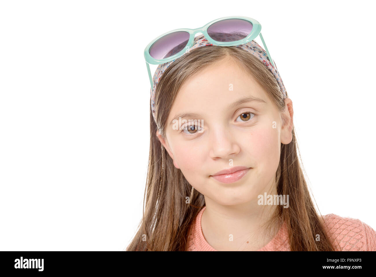 a portrait of a beautiful, serious girl on a white background Stock Photo