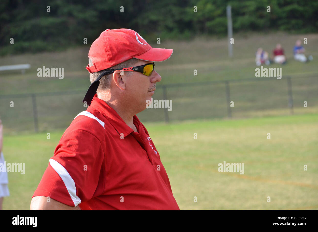 Girl's high school soccer coach Stock Photo Alamy