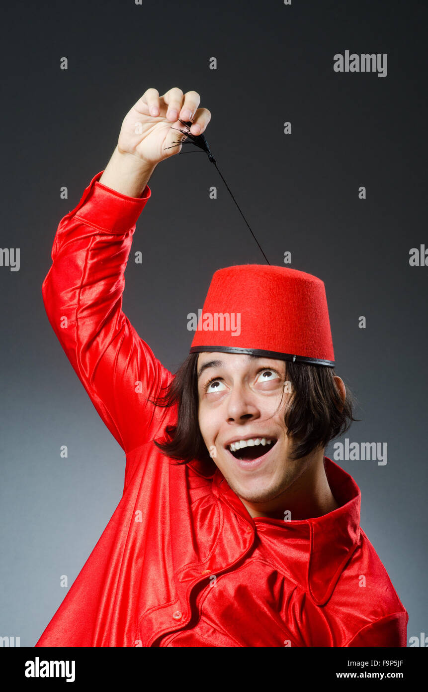 Man wearing red fez hat Stock Photo Alamy