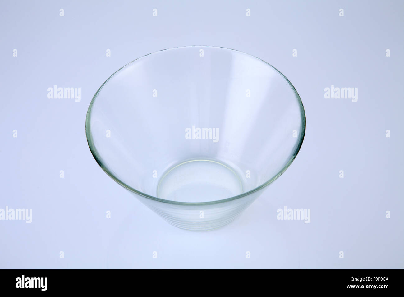 Close up view of an empty salad bowl isolated on a white background