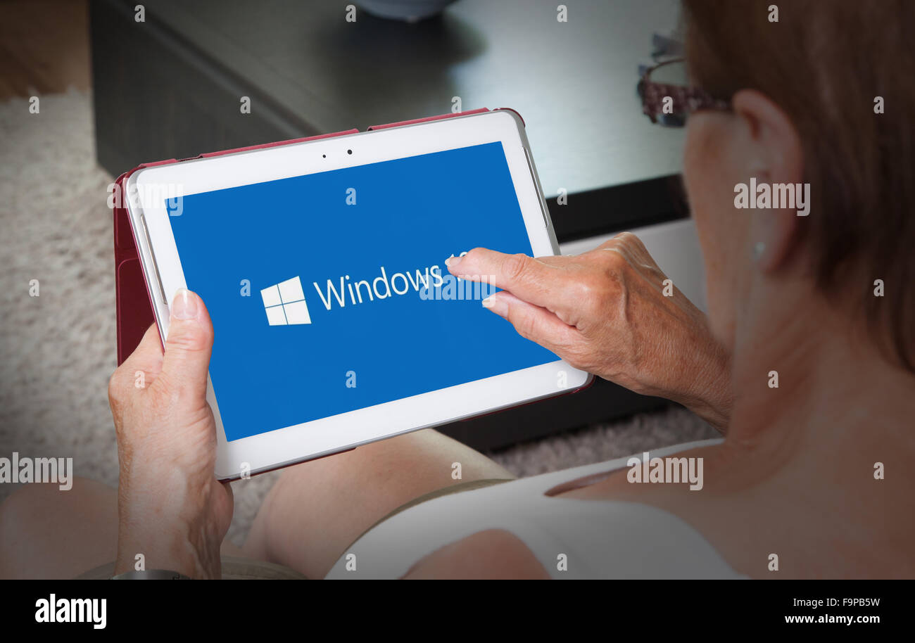 HEERENVEEN, NETHERLANDS, June 6, 2015: Tablet computer with Windows 10 logo. Windows 10 is the new version of Windows OS by Micr Stock Photo