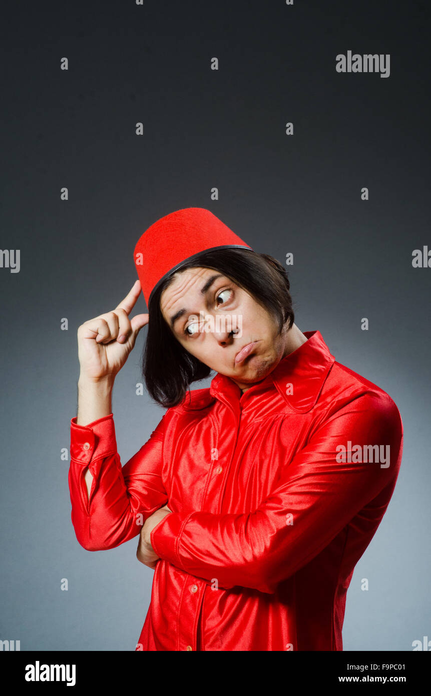 Man wearing red fez hat Stock Photo Alamy